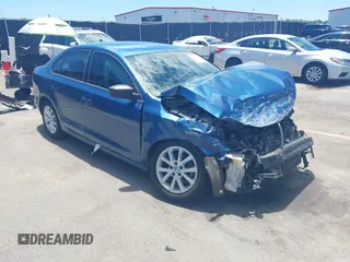 2015 Volkswagen Jetta SE z VIN 3VWD07AJXFM285827, wystawiony jako IAAI lot #42325223 z przebiegiem 148 225 mil mil oraz . Historia ofert i sprzedaży dostępna na DreamBid. Obrazek 1.