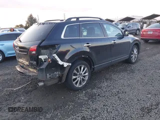 2014 Mazda CX-9 Grand Touring with VIN JM3TB3DV7E0429276, listed as a IAAI auction lot 41415446 with 94,939 mi miles and . Bid and sale history available at DreamBid. Image 4.