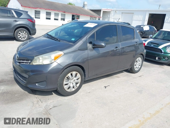 2012 Toyota Yaris L with VIN JTDKTUD38CD540219, listed as a IAAI auction lot 42091750 with 152,878 mi miles. Bid and sale history available at carsss.com. Image 17.
