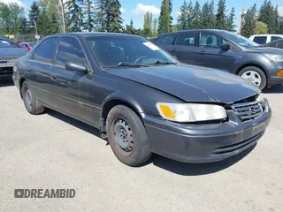 2001 Toyota Camry CE with VIN JT2BG22K410566882, listed as a IAAI auction lot 42084098 with 1 mi miles. Bid and sale history available at carsss.com. Image 1.