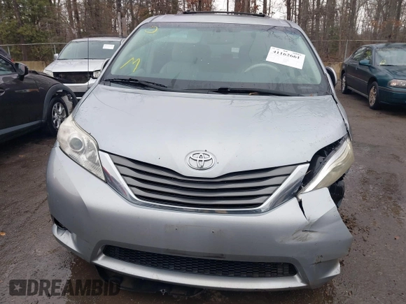 2013 Toyota Sienna XLE with VIN 5TDDK3DC5DS070243, listed as a IAAI auction lot 41162661 with 149,672 mi miles and . Bid and sale history available at DreamBid. Image 12.