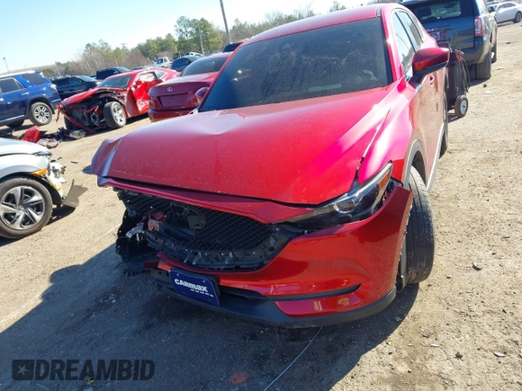 2019 Mazda CX-5 Sport with VIN JM3KFBBM2K0508743, listed as a IAAI auction lot 41288659 with 77,710 mi miles and . Bid and sale history available at DreamBid. Image 12.