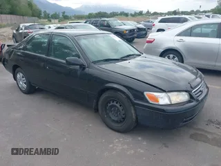 2001 Toyota Camry LE z VIN JT2BF22K710336692, wystawiony jako IAAI lot #42246172 z przebiegiem 93 461 mil mil oraz . Historia ofert i sprzedaży dostępna na DreamBid. Obrazek 1.