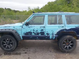1997 Jeep Cherokee SE z VIN 1J4FJ28S3VL573144, wystawiony jako IAAI lot #41965201 z przebiegiem 298 276 mil mil oraz . Historia ofert i sprzedaży dostępna na DreamBid. Obrazek 14.