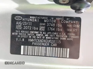 2012 Hyundai Veloster w/Gray Int with VIN KMHTC6ADXCU028115, listed as a IAAI auction lot 42361550 with 118,920 mi miles and . Bid and sale history available at DreamBid. Image 9.