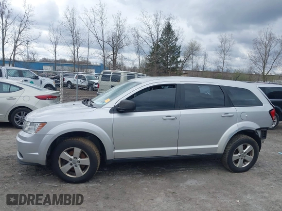 2013 Dodge Journey SE with VIN 3C4PDCAB9DT532554, listed as a IAAI auction lot 42026129 with 164,599 mi miles. Bid and sale history available at carsss.com. Image 15.