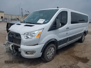 2021 Ford Transit Passenger XL with VIN 1FBAX2Y88MKA13051, listed as a IAAI auction lot 42173862 with 73,507 mi miles. Bid and sale history available at carsss.com. Image 18.