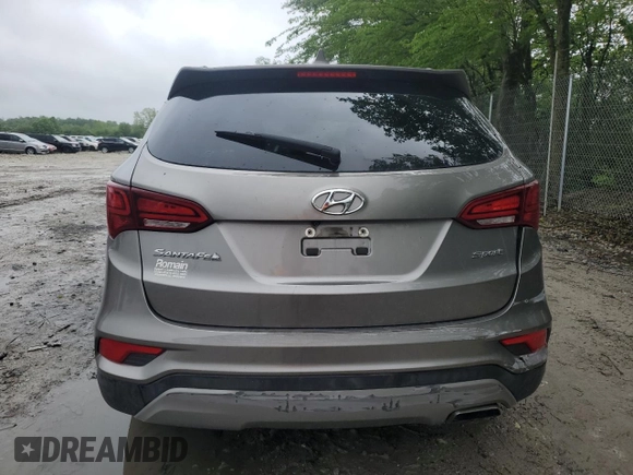 2017 Hyundai Santa Fe 2.4L z VIN 5NMZU3LB8HH032409, wystawiony jako Copart lot #57939915 z przebiegiem 105 494 mil mil oraz Szkoda całkowita • Salvage title. Historia ofert i sprzedaży dostępna na DreamBid. Obrazek 6.
