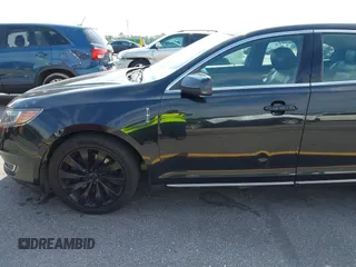 2015 Lincoln MKS с VIN 1LNHL9DK2FG600346, выставлен на аукционе IAAI как лот 42282772 с пробегом 347 761 миль миль и . История ставок и продаж доступна на DreamBid. Изображение 21.