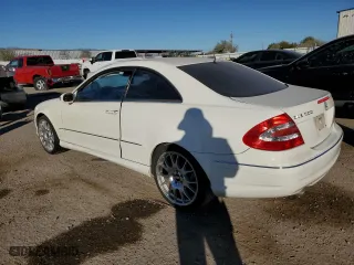 2003 Mercedes-Benz CLK-Class 5.0L with VIN WDBTJ75J23F016902, listed as a Copart auction lot 86643094 with 194,481 mi miles and Salvage Title. Bid and sale history available at carsss.com. Image 2.