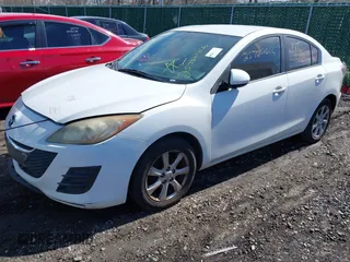 2010 Mazda Mazda3 i Touring with VIN JM1BL1SF1A1169933, listed as a IAAI auction lot 41832033 with 999,999 mi miles. Bid and sale history available at carsss.com. Image 2.