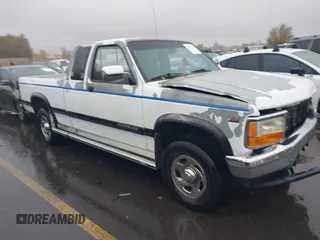 1994 Dodge Dakota z VIN 1B7GG23X0RS575506, wystawiony jako IAAI lot #40965226 z przebiegiem 89 884 mil mil oraz . Historia ofert i sprzedaży dostępna na DreamBid. Obrazek 1.