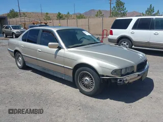 1997 BMW 7 Series z VIN WBAGF8323VDL47876, wystawiony jako IAAI lot #42861334 z przebiegiem 190 914 mil mil oraz . Historia ofert i sprzedaży dostępna na DreamBid. Obrazek 1.