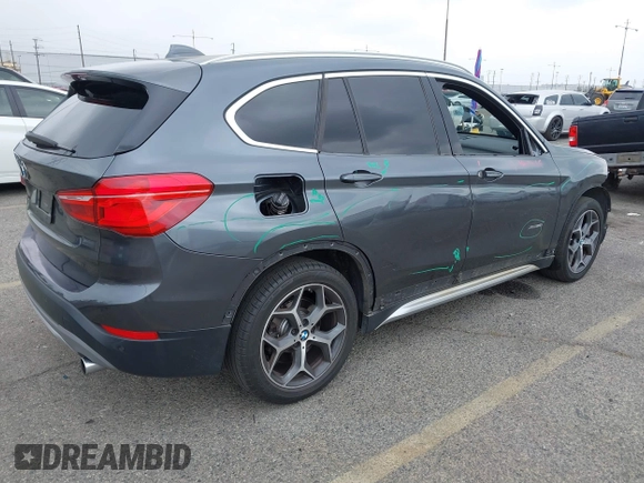 2016 BMW X1 xDrive28i with VIN WBXHT3C32GP886084, listed as a IAAI auction lot 41895754 with 85,662 mi miles and . Bid and sale history available at DreamBid. Image 4.