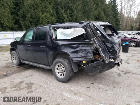 2010 Chevrolet Suburban LS z VIN 1GNUKHE3XAR192464, wystawiony jako Copart lot #87311324 z przebiegiem Nie podano mil oraz Szkoda całkowita • Salvage title. Historia ofert i sprzedaży dostępna na DreamBid. Obrazek 2.
