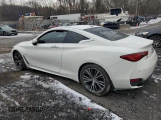 2017 Infiniti Q60 Premium with VIN JN1CV7EL9HM320869, listed as a Copart auction lot 84380414 with 99,797 mi miles and Salvage title. Bid and sale history available at DreamBid. Image 2.