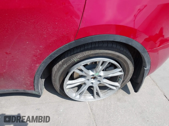 2023 Tesla Model Y Long Range z VIN 7SAYGAEE7PF691499, wystawiony jako IAAI lot #42038850 z przebiegiem 26 439 mil mil oraz . Historia ofert i sprzedaży dostępna na DreamBid. Obrazek 23.