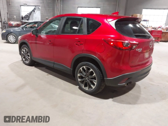 2016 Mazda CX-5 Grand Touring with VIN JM3KE4DY6G0690923, listed as a IAAI auction lot 41875553 with 179,489 mi miles. Bid and sale history available at carsss.com. Image 3.