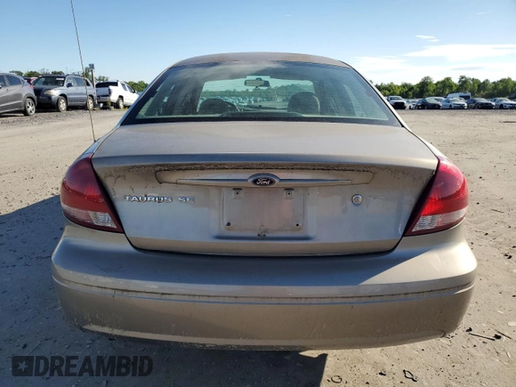 2004 Ford Taurus SE z VIN 1FAFP53284A156633, wystawiony jako Copart lot #58164985 z przebiegiem 91 246 mil mil oraz Szkoda całkowita • Salvage title. Historia ofert i sprzedaży dostępna na DreamBid. Obrazek 6.