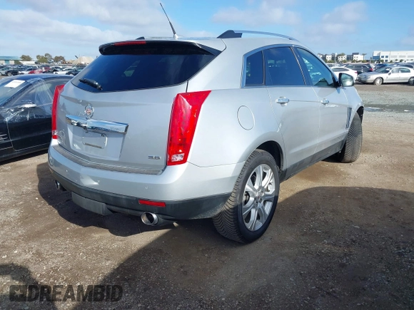 2014 Cadillac SRX Performance Collection with VIN 3GYFNCE39ES544135, listed as a IAAI auction lot 41808644 with 145,772 mi miles and . Bid and sale history available at carsss.com. Image 4.