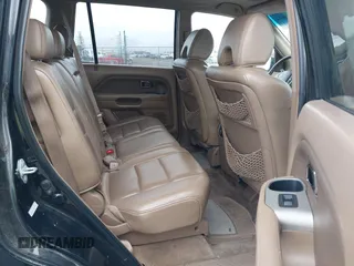 2006 Honda Pilot EX-L with VIN 2HKYF18726H552054, listed as a IAAI auction lot 41822652 with 153,822 mi miles and . Bid and sale history available at DreamBid. Image 8.