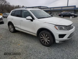 2015 Volkswagen Touareg Lux с VIN WVGEP9BP2FD002247, выставлен на аукционе Copart как лот 41924615 с пробегом 127 543 миль миль и Списание • Salvage title. История ставок и продаж доступна на DreamBid. Изображение 4.