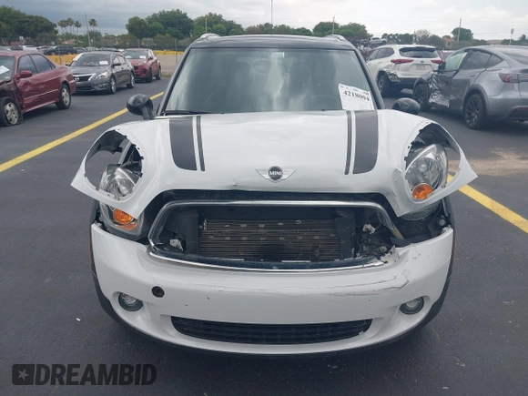 2012 MINI Countryman z VIN WMWZB3C56CWM04087, wystawiony jako IAAI lot #42180040 z przebiegiem 37 789 mil mil oraz . Historia ofert i sprzedaży dostępna na DreamBid. Obrazek 13.
