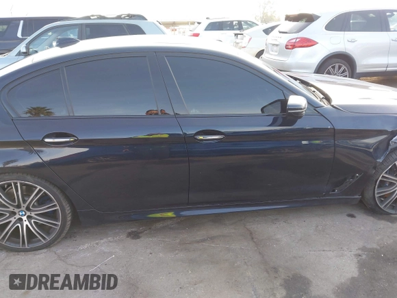 2017 BMW 5 Series 540i with VIN WBAJE5C38HG915154, listed as a IAAI auction lot 41572287 with 87,549 mi miles and . Bid and sale history available at carsss.com. Image 14.