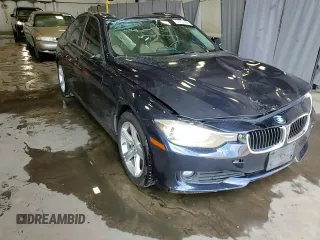 2014 BMW 3 Series 320i with VIN WBA3B1G5XENT00747, listed as a Copart auction lot 64737935 with 123,374 mi miles and Salvage title. Bid and sale history available at DreamBid. Image 13.