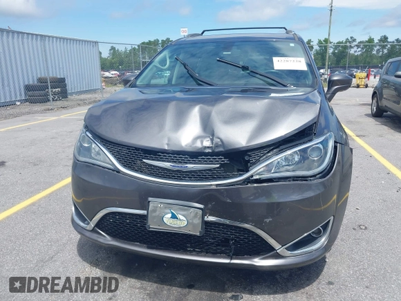 2020 Chrysler Pacifica Touring L with VIN 2C4RC1BG1LR269004, listed as a IAAI auction lot 42287228 with 71,498 mi miles and . Bid and sale history available at DreamBid. Image 12.