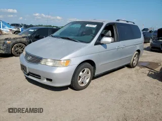 2001 Honda Odyssey EX z VIN 2HKRL18641H619203, wystawiony jako Copart lot #59329555 z przebiegiem 180 058 mil mil oraz Czysty tytuł • Clean title. Historia ofert i sprzedaży dostępna na DreamBid. Obrazek 1.