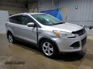 2014 Ford Escape SE with VIN 1FMCU9GX1EUC26584, listed as a Copart auction lot 49311145 with 130,545 mi miles and Salvage Title. Bid and sale history available at carsss.com. Image 4.
