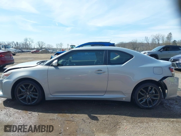 2014 Scion tC with VIN JTKJF5C70E3068144, listed as a IAAI auction lot 41983751 with 137,894 mi miles. Bid and sale history available at carsss.com. Image 14.