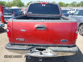 2002 Ford F-150 XLT with VIN 1FTRW07682KC33857, listed as a IAAI auction lot 41870137 with 185,480 mi miles. Bid and sale history available at carsss.com. Image 17.