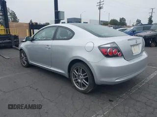 2010 Scion tC with VIN JTKDE3B70A0319343, listed as a IAAI auction lot 41985804 with 133,595 mi miles. Bid and sale history available at carsss.com. Image 3.