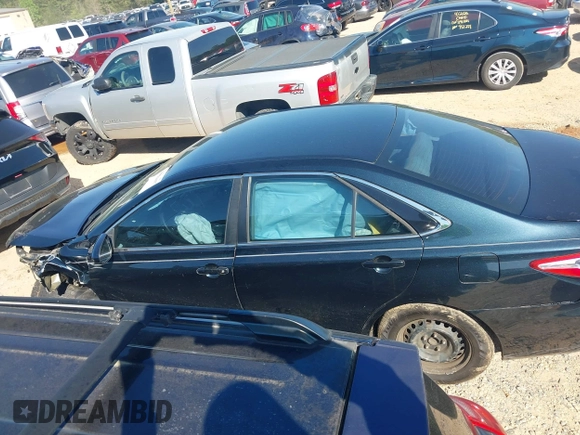 2016 Toyota Camry XLE with VIN 4T4BF1FK0GR553970, listed as a IAAI auction lot 41981657 with 224,806 mi miles and . Bid and sale history available at DreamBid. Image 14.