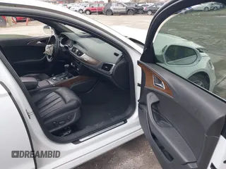 2014 Audi A6 Prestige z VIN WAUHMAFC6EN098487, wystawiony jako IAAI lot #41908034 z przebiegiem 146 298 mil mil oraz . Historia ofert i sprzedaży dostępna na DreamBid. Obrazek 5.