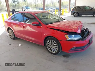 2015 Volkswagen Jetta Sedan 1.8T SE with VIN 3VWD17AJ3FM284712, listed as a IAAI auction lot 42052882 with 140,088 mi miles. Bid and sale history available at carsss.com. Image 1.