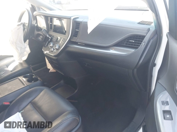 2015 Toyota Sienna SE with VIN 5TDXK3DC4FS566084, listed as a IAAI auction lot 41777561 with 153,002 mi miles and . Bid and sale history available at carsss.com. Image 5.