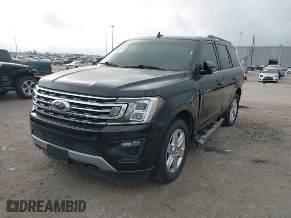 2019 Ford Expedition XLT with VIN 1FMJU1JT9KEA16156, listed as a IAAI auction lot 41472260 with 154,097 mi miles and . Bid and sale history available at DreamBid. Image 2.