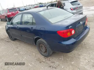 2004 Toyota Corolla CE with VIN 2T1BR32E44C261569, listed as a IAAI auction lot 42013805 with 299,999 mi miles and . Bid and sale history available at DreamBid. Image 3.