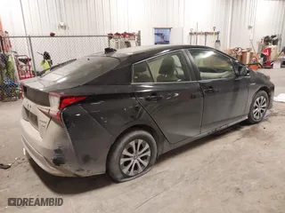 2022 Toyota Prius LE with VIN JTDL9MFU4N3035988, listed as a IAAI auction lot 41389054 with 56,633 mi miles. Bid and sale history available at carsss.com. Image 4.