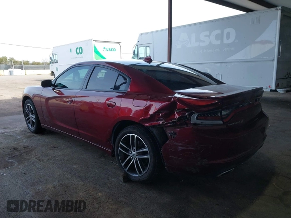2019 Dodge Charger SXT with VIN 2C3CDXJG0KH757909, listed as a IAAI auction lot 41597907 with 71,882 mi miles and . Bid and sale history available at DreamBid. Image 6.