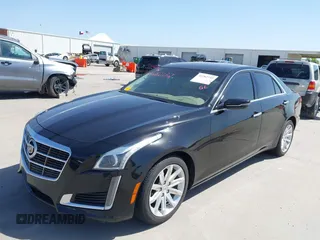 2014 Cadillac CTS Luxury RWD z VIN 1G6AR5SX3E0196348, wystawiony jako IAAI lot #42282732 z przebiegiem 130 956 mil mil oraz . Historia ofert i sprzedaży dostępna na DreamBid. Obrazek 2.