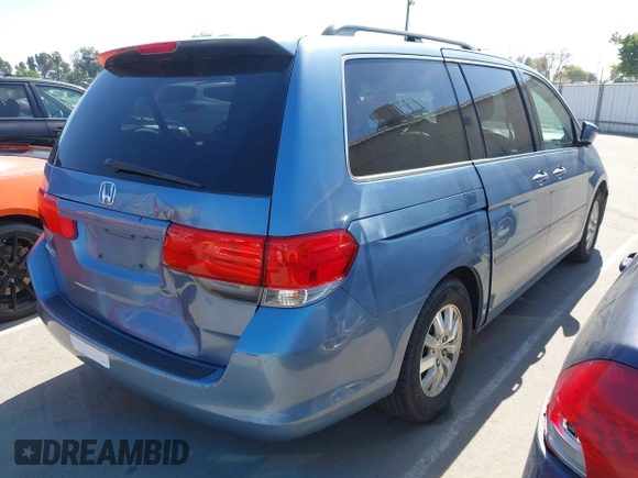 2010 Honda Odyssey EX-L with VIN 5FNRL3H64AB071603, listed as a IAAI auction lot 42084026 with 199,753 mi miles. Bid and sale history available at carsss.com. Image 4.