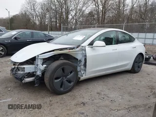 2020 Tesla Model 3 Standard Range Plus with VIN 5YJ3E1EA1LF799766, listed as a IAAI auction lot 41386508 with 90,000 mi miles. Bid and sale history available at carsss.com. Image 15.