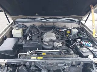 1999 Lexus LX 470 z VIN JT6HT00W4X0056023, wystawiony jako IAAI lot #41319329 z przebiegiem 206 974 mil mil oraz . Historia ofert i sprzedaży dostępna na DreamBid. Obrazek 10.