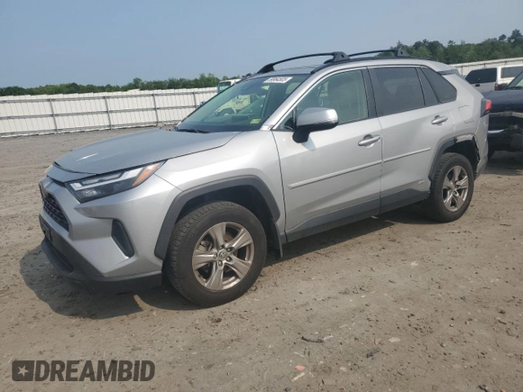 2023 Toyota RAV4 Hybrid XLE with VIN JTMRWRFV7PD166743, listed as a Copart auction lot 59964505 with 87,404 mi miles and Salvage title. Bid and sale history available at DreamBid. Image 1.