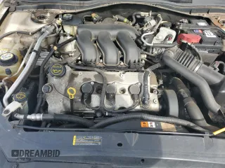 2007 Ford Fusion SE with VIN 3FAHP01107R141043, listed as a Copart auction lot 52027495 with 101,170 mi miles and Salvage Title. Bid and sale history available at carsss.com. Image 11.