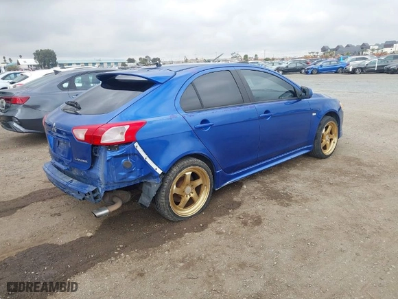 2010 Mitsubishi Lancer GTS with VIN JA32X8HW3AU011482, listed as a IAAI auction lot 41521067 with 186,620 mi miles. Bid and sale history available at carsss.com. Image 4.